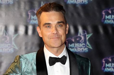 robbie williams gay|Robbie Williams says he used to identify as somewhat gay but。